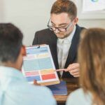 man explaining checklist