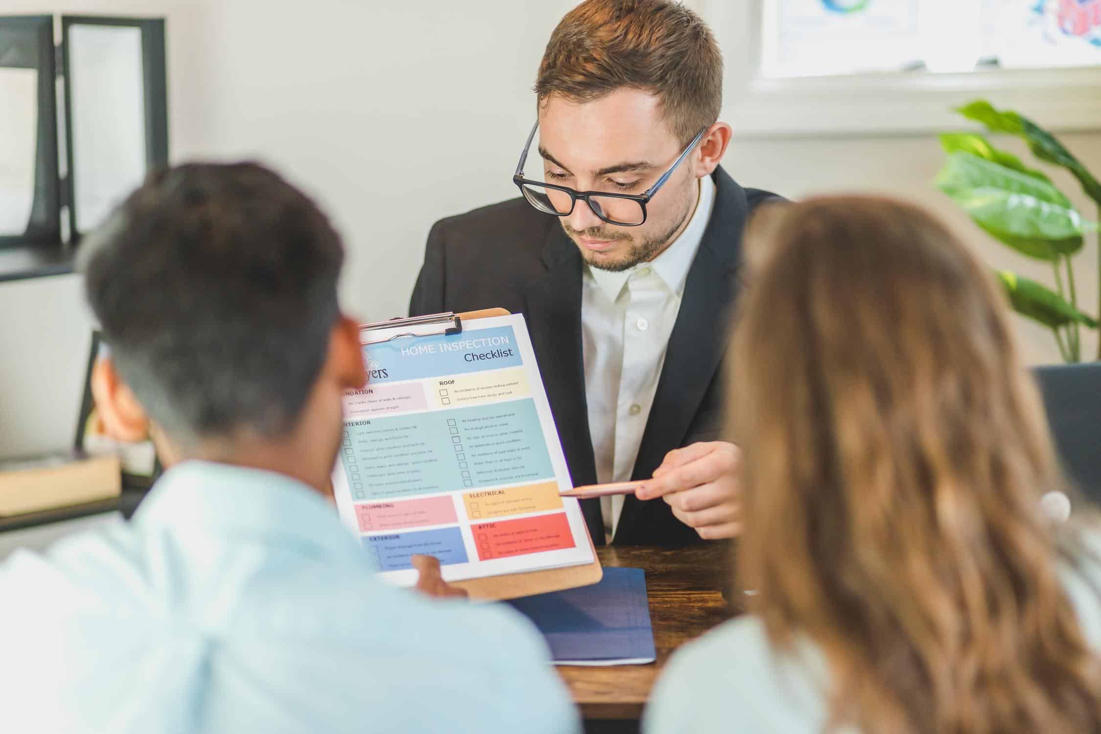 man explaining checklist