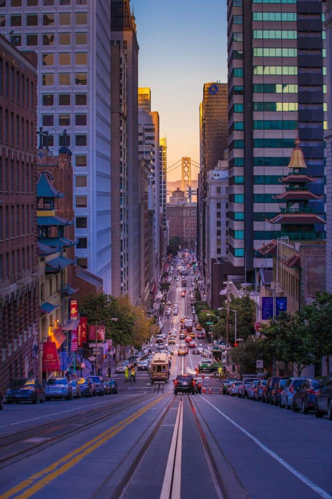 city road between sky scrapers