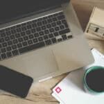 laptop beside a coffee