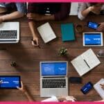 table with people and gadgets