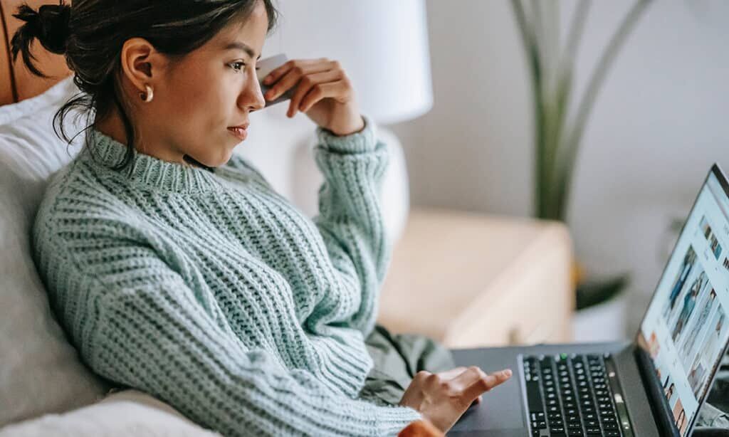 woman looking at a laptop