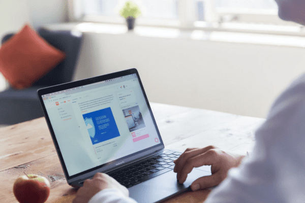 a person in front of a laptop